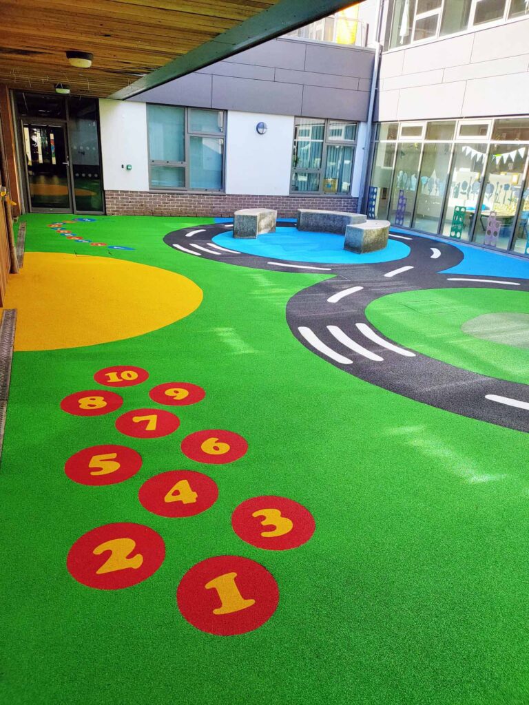 Colourful wetpour surfacing, Custom colour blends, Multi-colour wetpour designs, Bright playground colours, EPDM rubber colour options, Wetpour pattern designs, Themed playground surfacing, Safety surfacing colour combinations, Decorative wetpour finishes, Colour matching wetpour, Creative playground designs, Durable coloured rubber flooring, Wetpour graphics and shapes, Custom logo wetpour designs, Wetpour installation Roodepoort, Wetpour surfacing Midrand